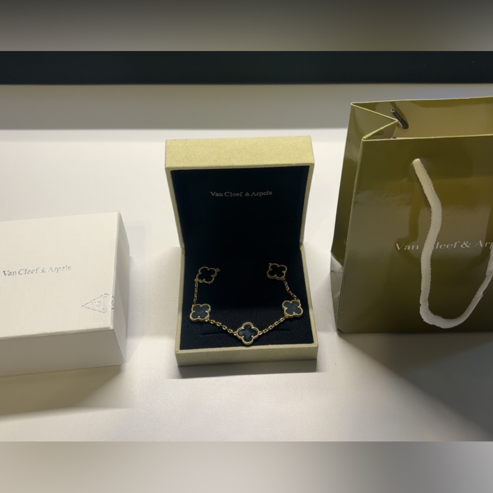 Van Cleef & Arpels Gold Bracelet with Black Clover Motifs
